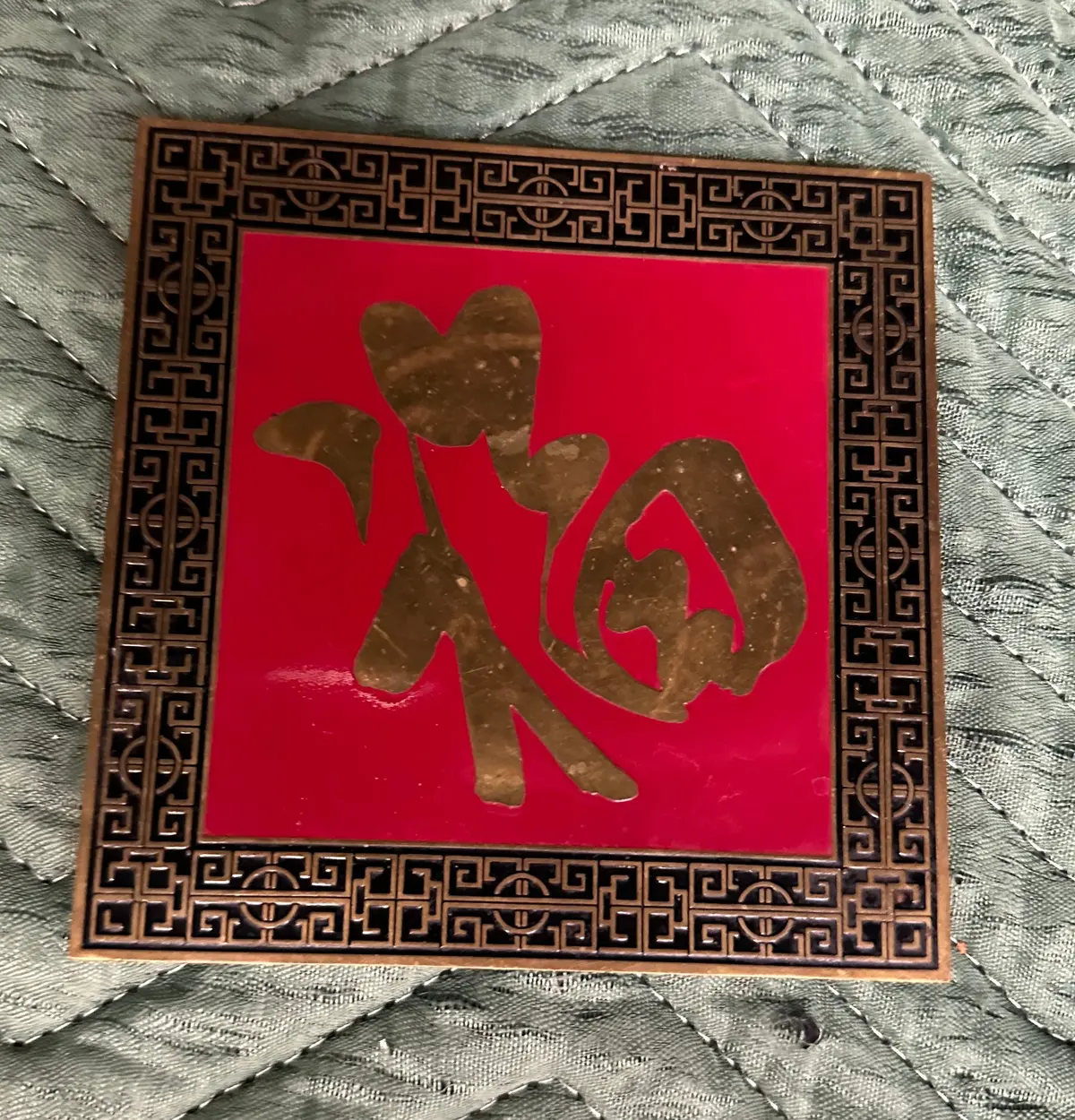 Red With Brass Character Trivet 1