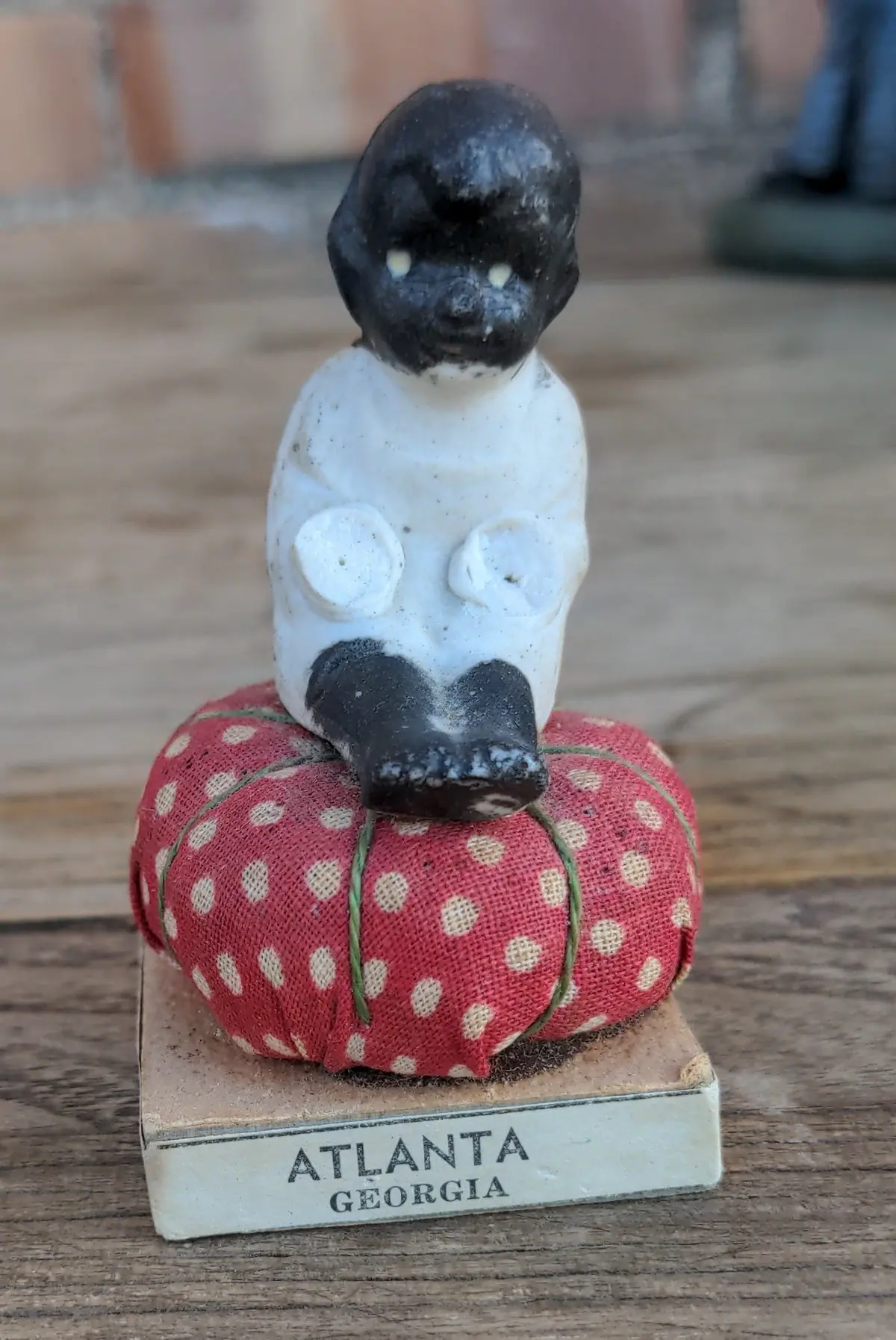 Small Black Memorabilia Baby On Pincushion 1
