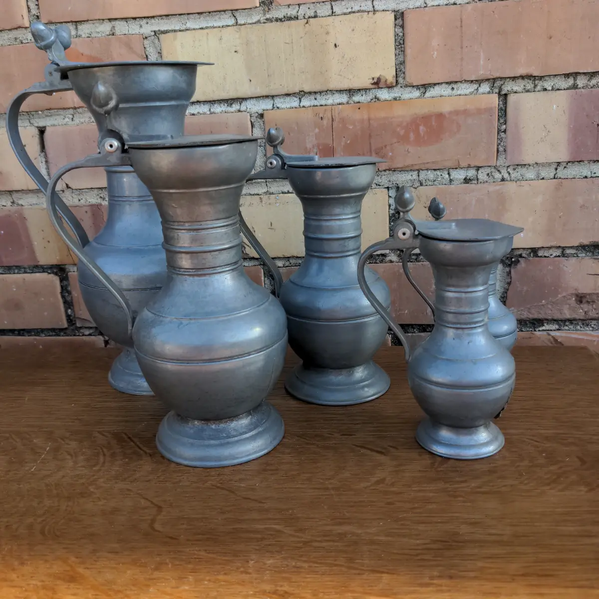 5 Piece Set Of Graduated Pewter Measures 1