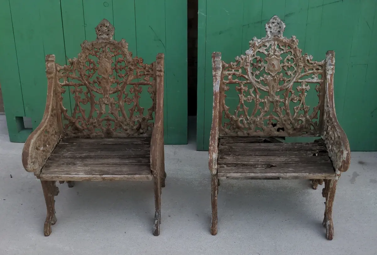 Pair Of Heavy Cast Iron Arm Chairs 1