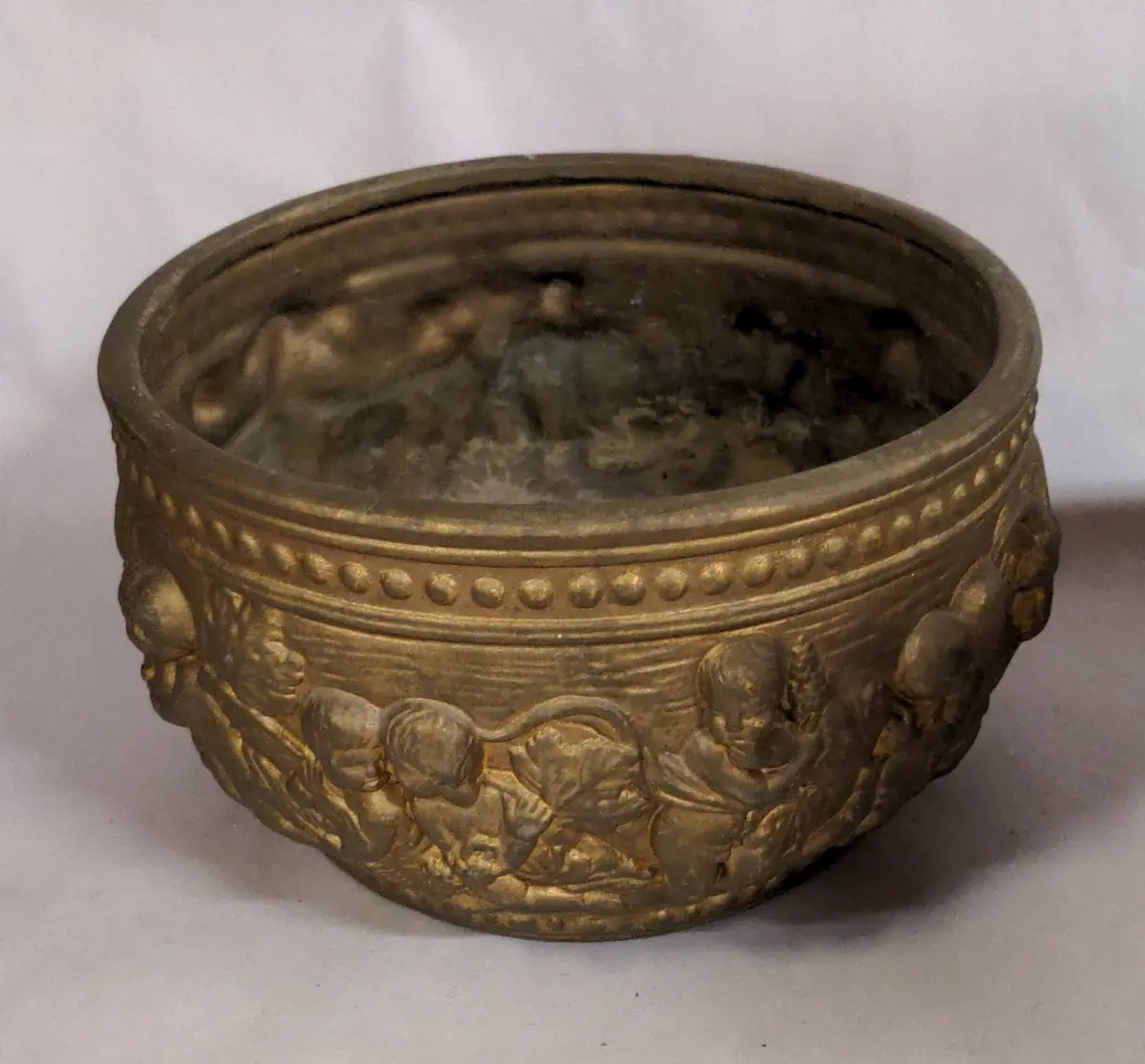 Round Brass Color Pottery Planter With Goats And Cherubs 1