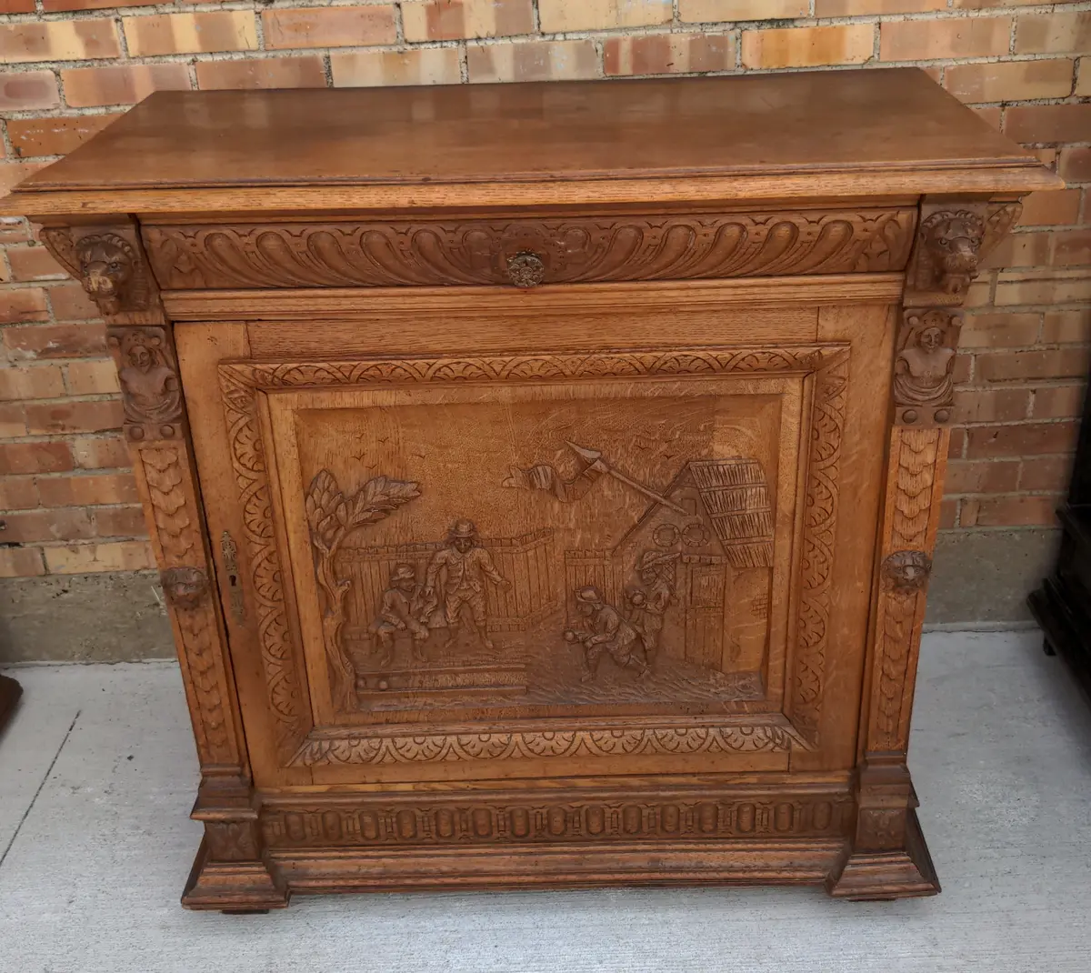 Oak Figural Carved Single Door Cabinet With Lion Heads 1
