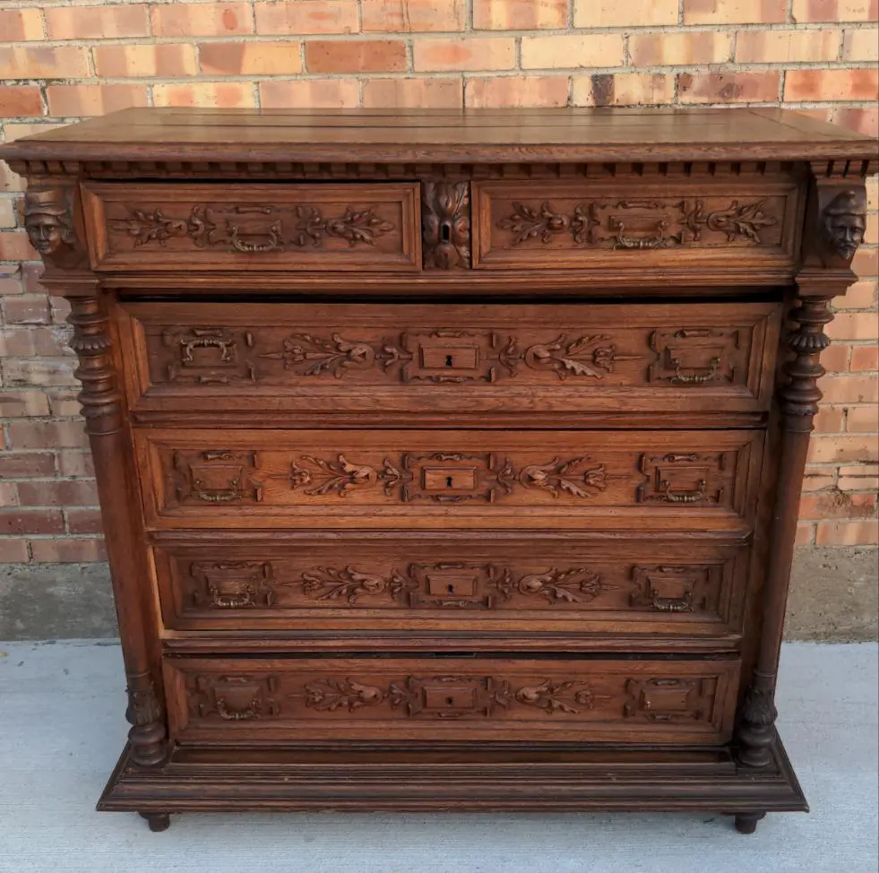 Six Drawer French Oak Chest With Heads 1