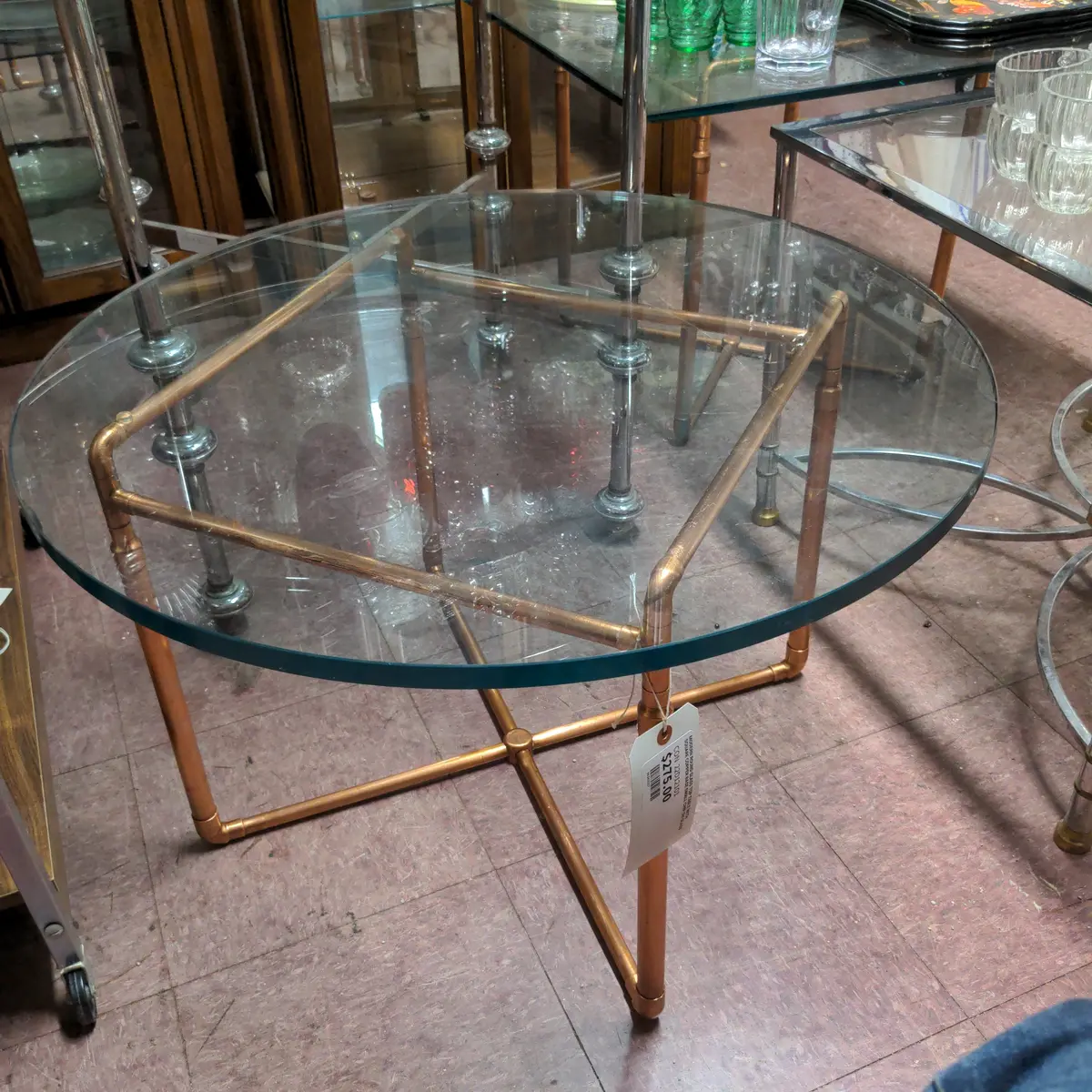 Modern Round Glass Top Table With Square Copper Base Small Chip On Glass 1