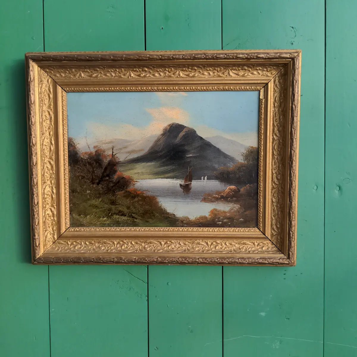 Oil Painting On Board Of A Boat In Lake By A Mountain 1