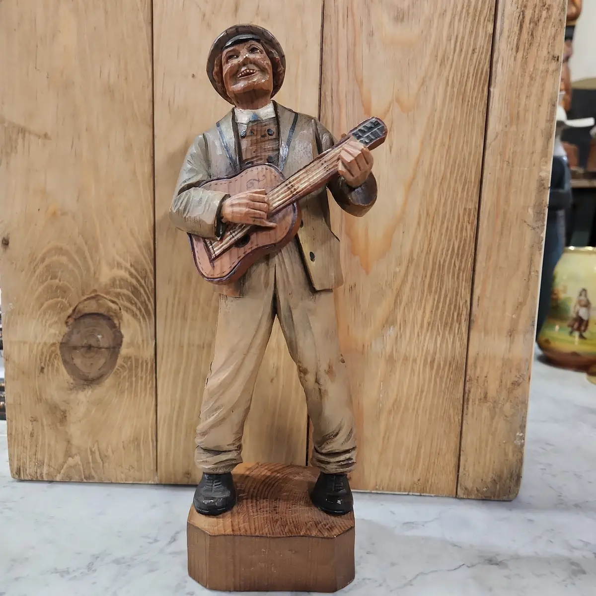Wood Swiss Carving Of Guitarman 1