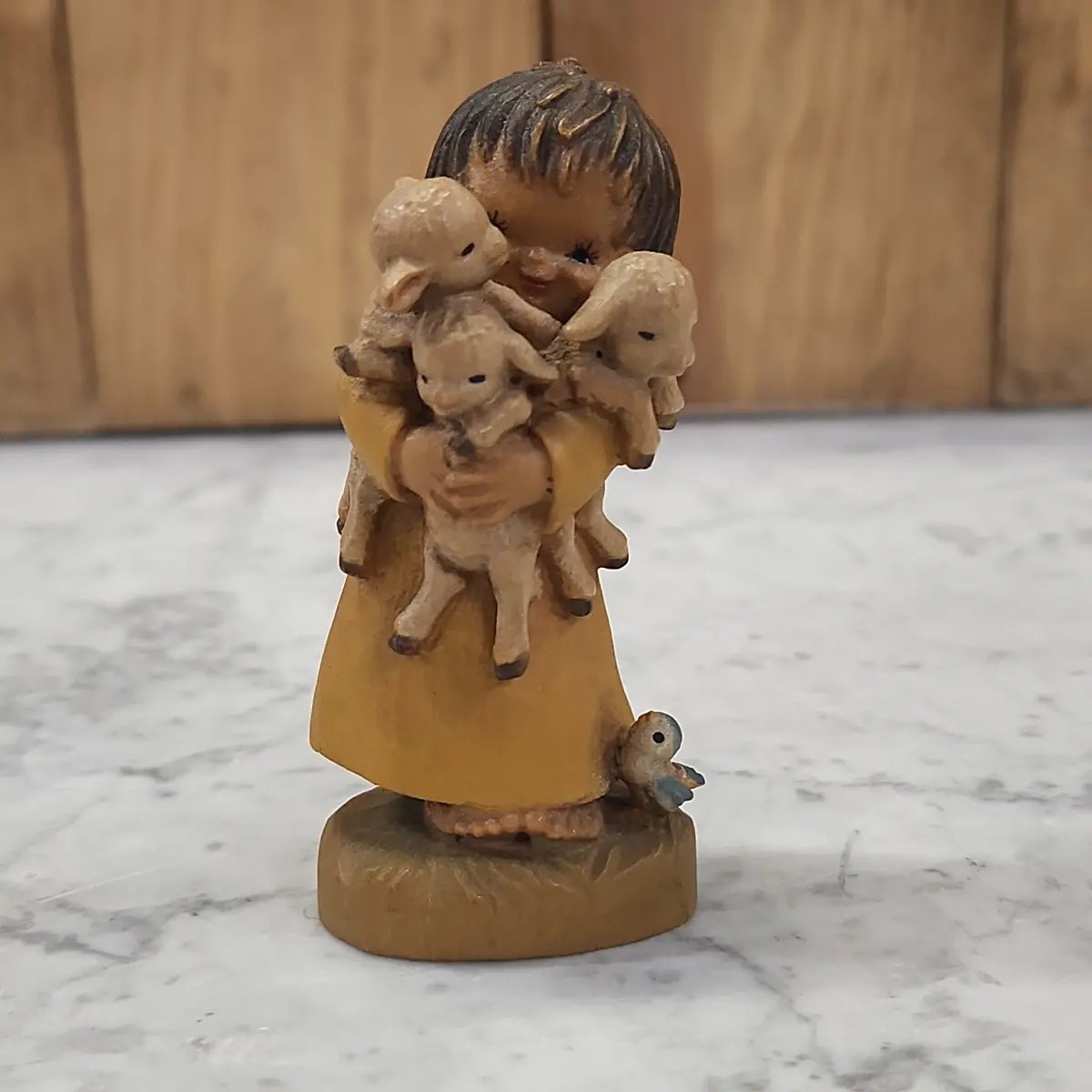 Wood Carving Of A Girl With Lambs 1