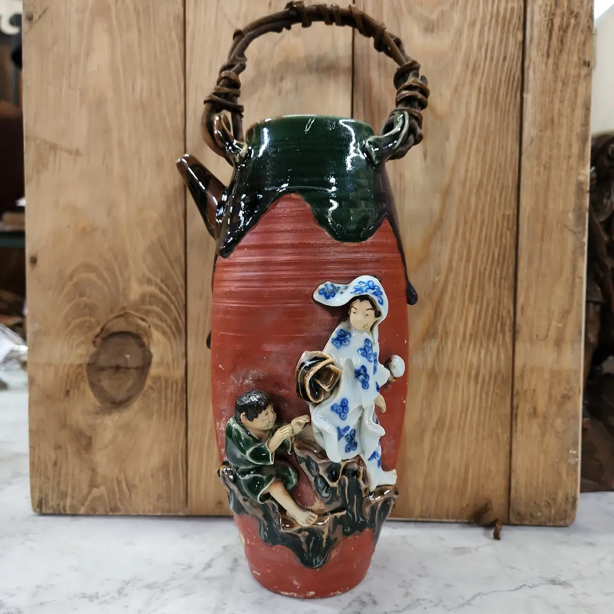 Sumida Gawa Tall Teapot With Two Figures And Vine Handle 1