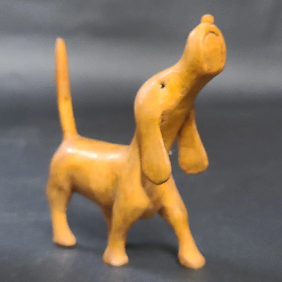 Wood Dog With Nose In Air 1