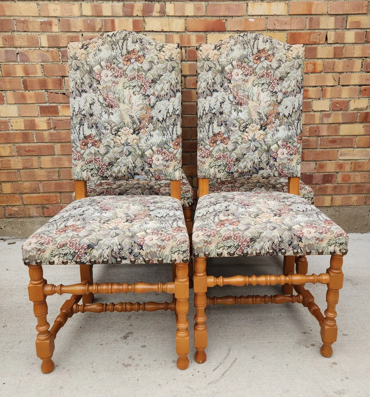 Set Of Four Upholstered Arched Back Chairs 1