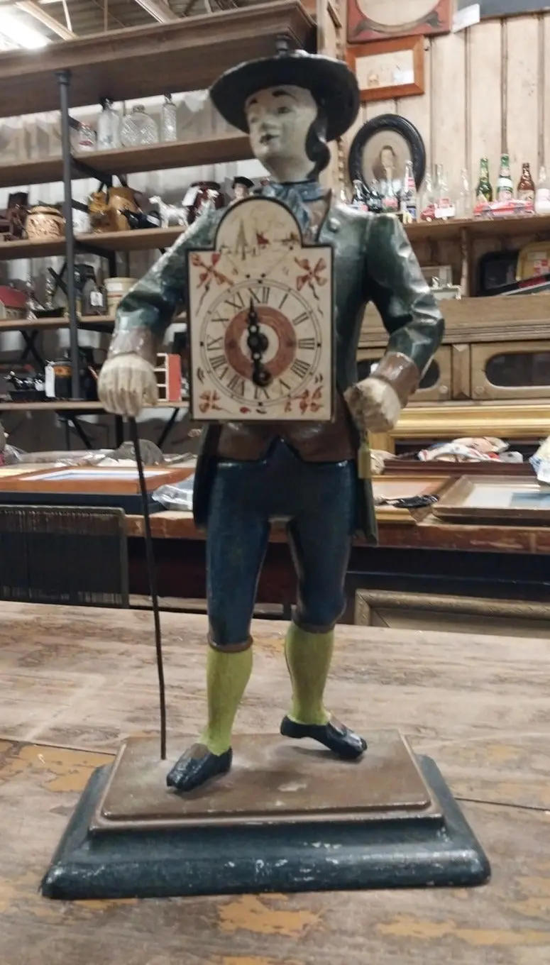 Cast Iron Man Figure Clock 1