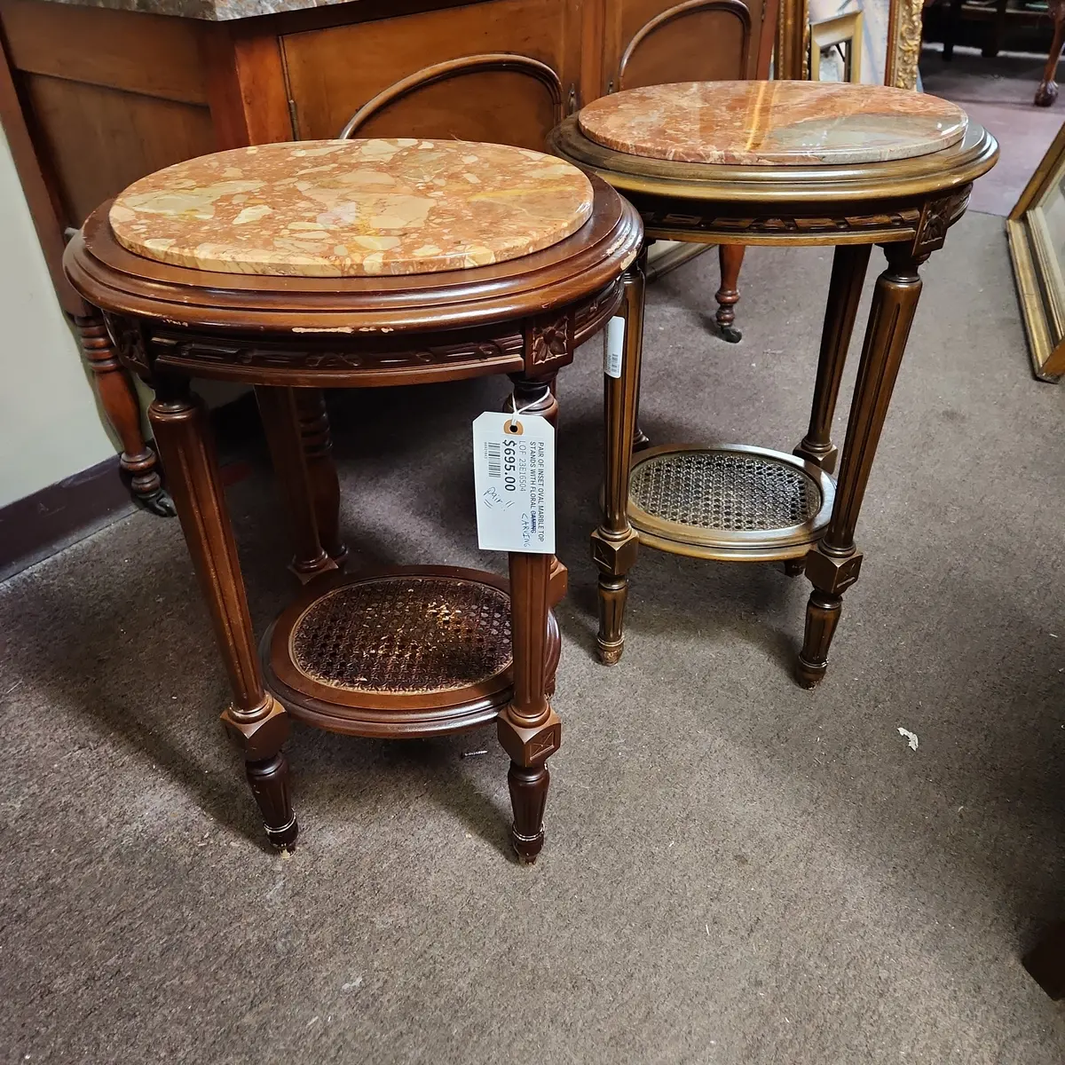 Pair Of Inset Oval Marble Top Stands With Floral Carving And Caning 1