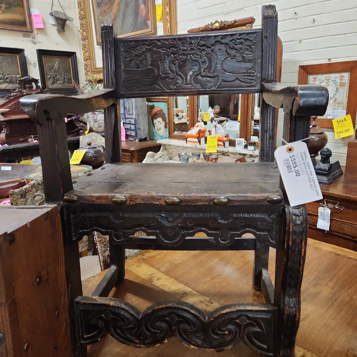 Small Dark Oak Carved Arm Chair With Leather Seat 1
