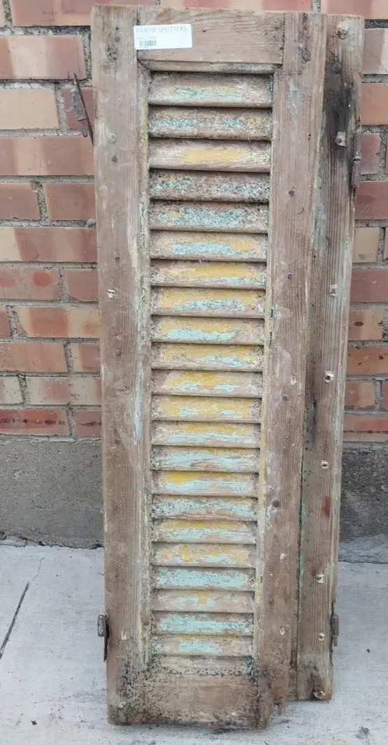 Pair Of Shabby Green And Yellow Shutters 1