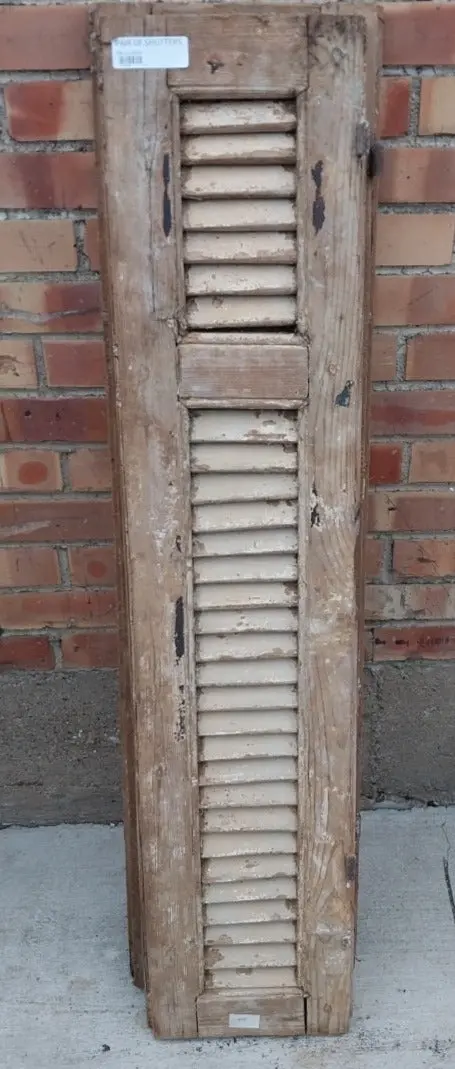 Pair Of Distressed Shutters With Yellow Paintter 1