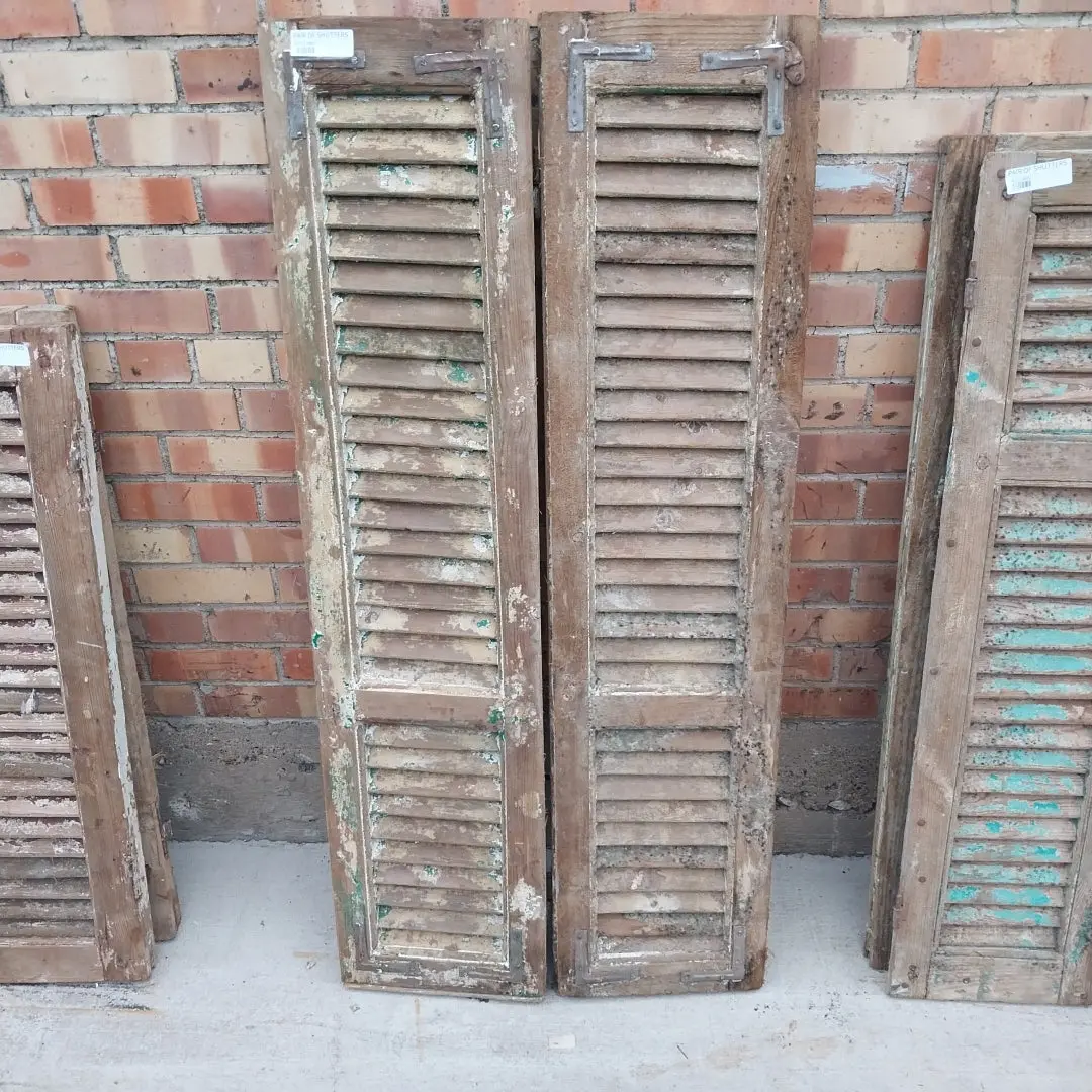 Pair Of Distressed Shutters With Green And Yellow Paint 1