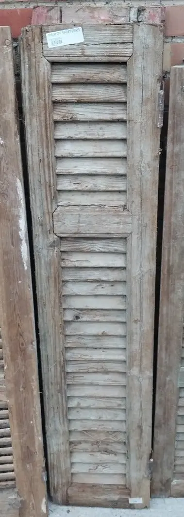 Pair Of Distressed Shutters With Pink Paint 1