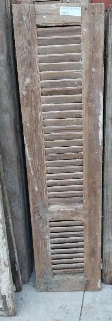 Pair Of Distressed Shutters With Pink Paint 1