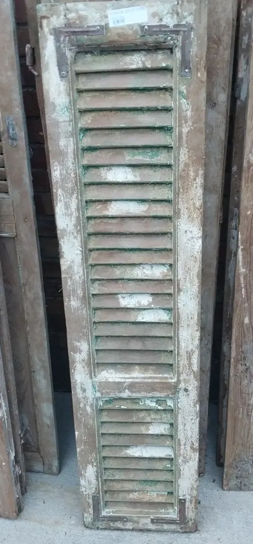 Pair Of Distressed Shutters With Green Paint 1