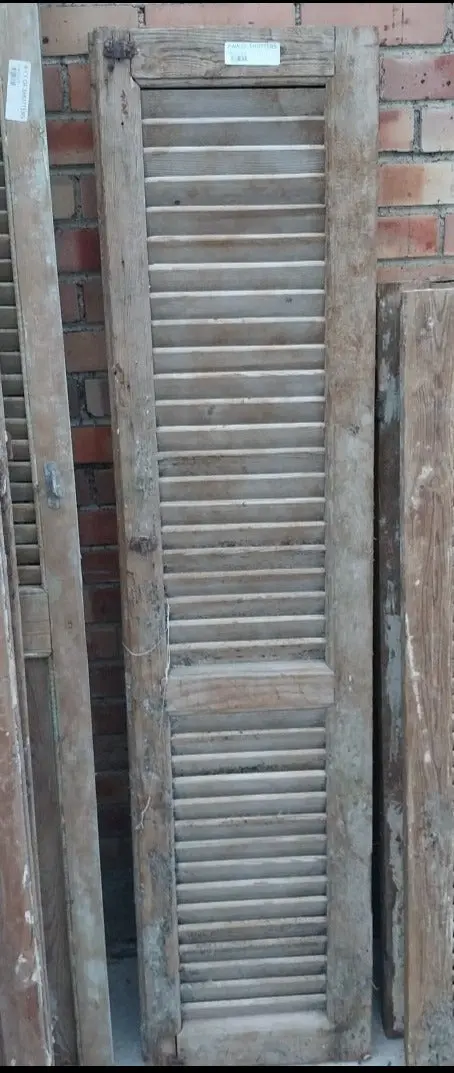 Pair Of Distressed Shutters With Green Paint 1