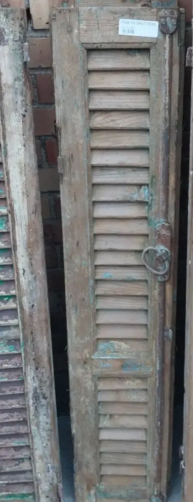 Pair Of Distressed Shutters With Green Paint 1