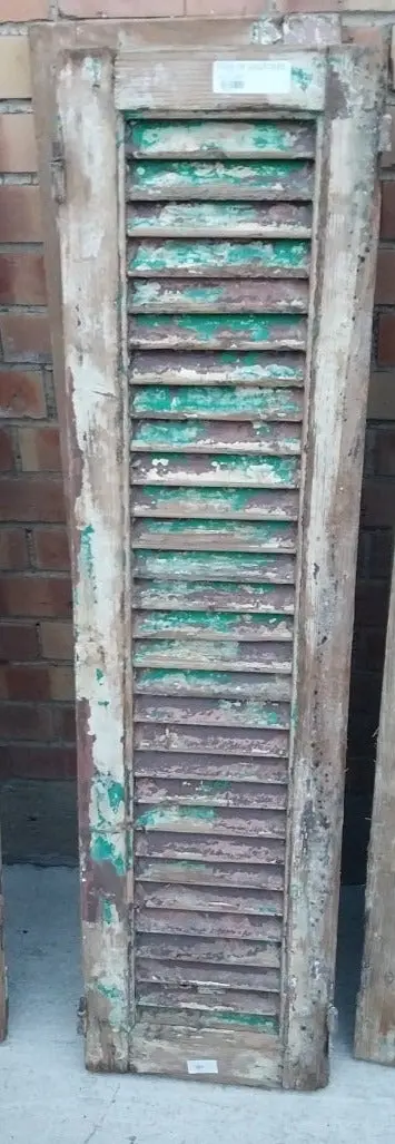 Pair Of Distressed Shutters With Green Paint 1