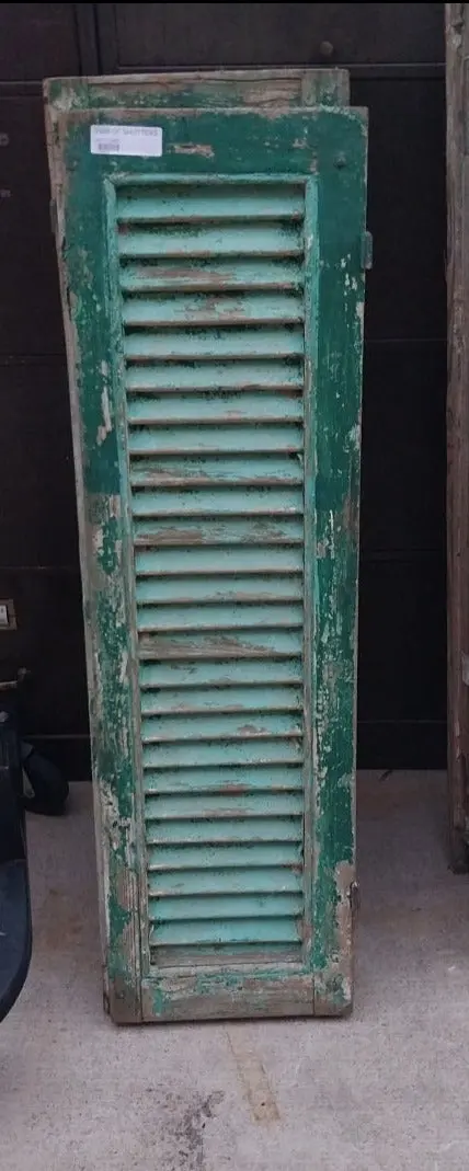 Pair Of Distressed Shutters With Green Paint 1