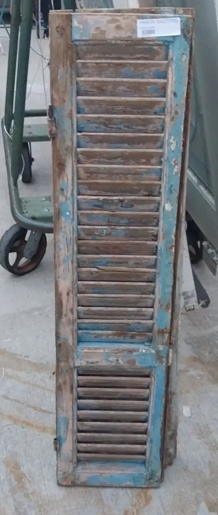 Pair Of Distressed Shutters With Blue Paint 1