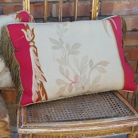 Pair Of Cream And Red Pillows 1