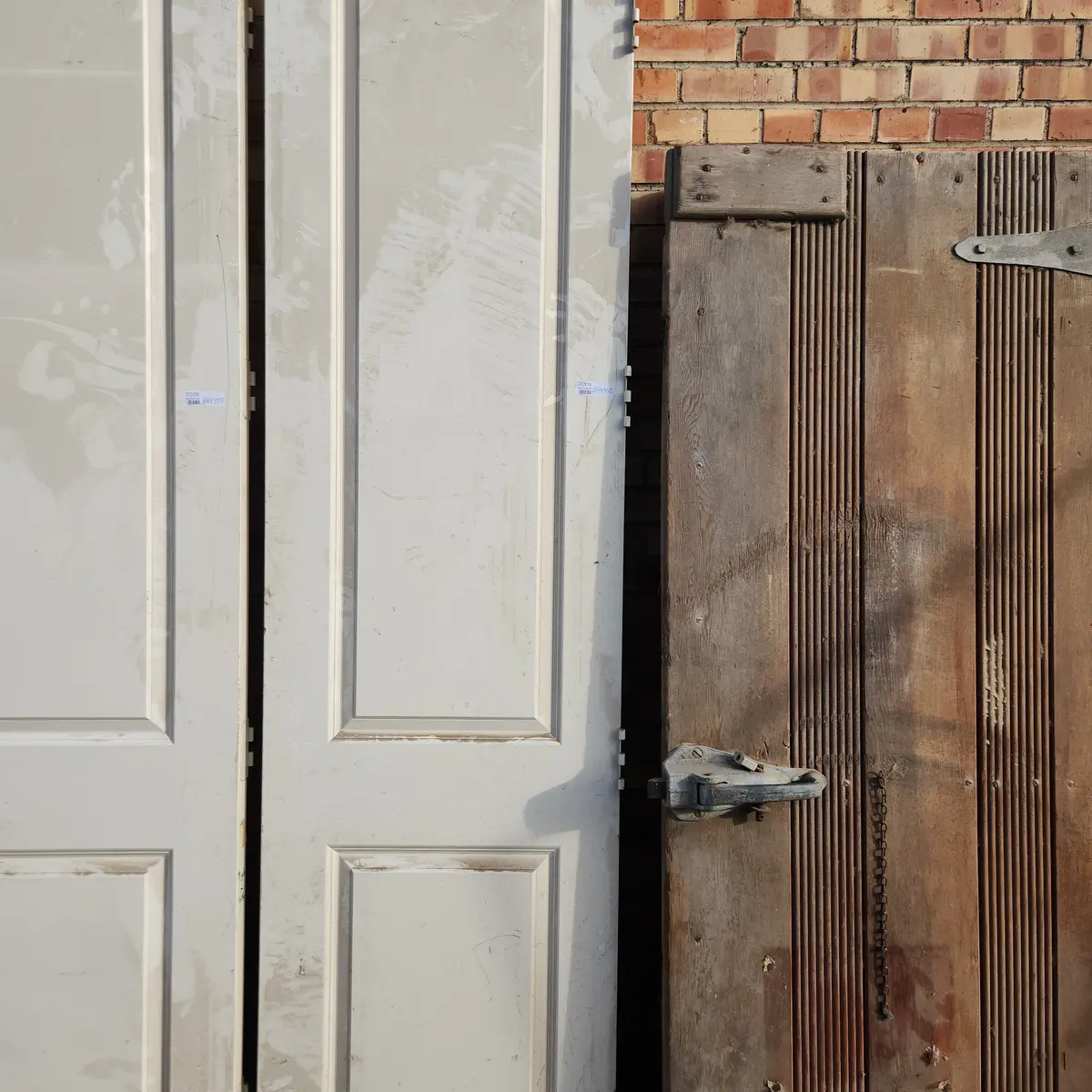 Pair Tall Slender White Doors 1