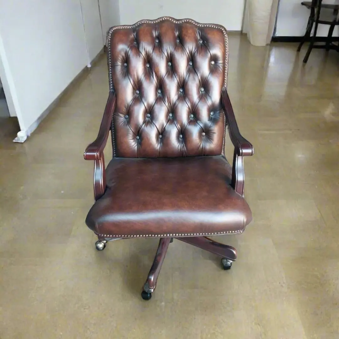Brown Tufted Leather Rolling Arm Chair 1