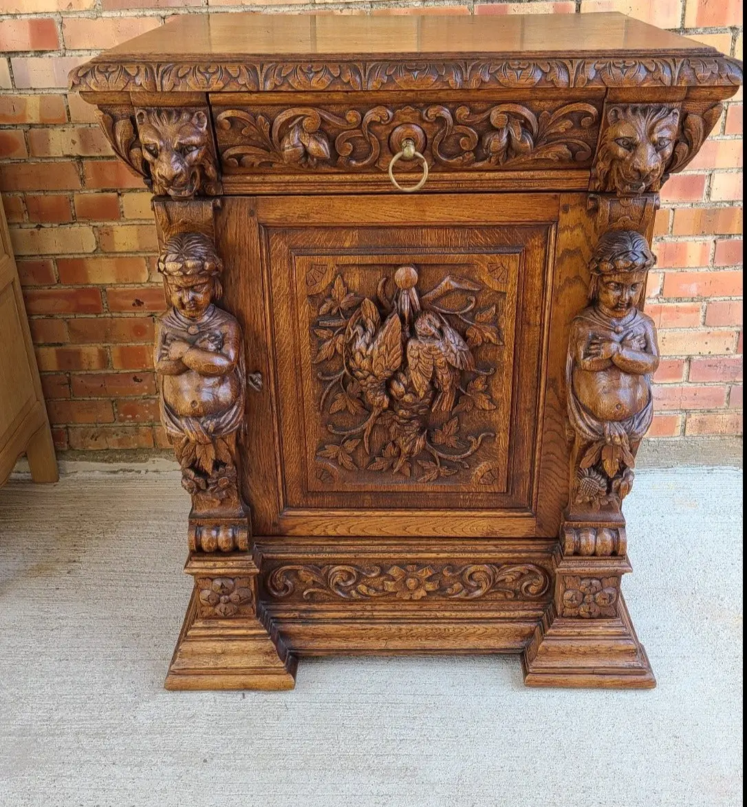 Large Putti Carved Jam Cupboard With Bird 1
