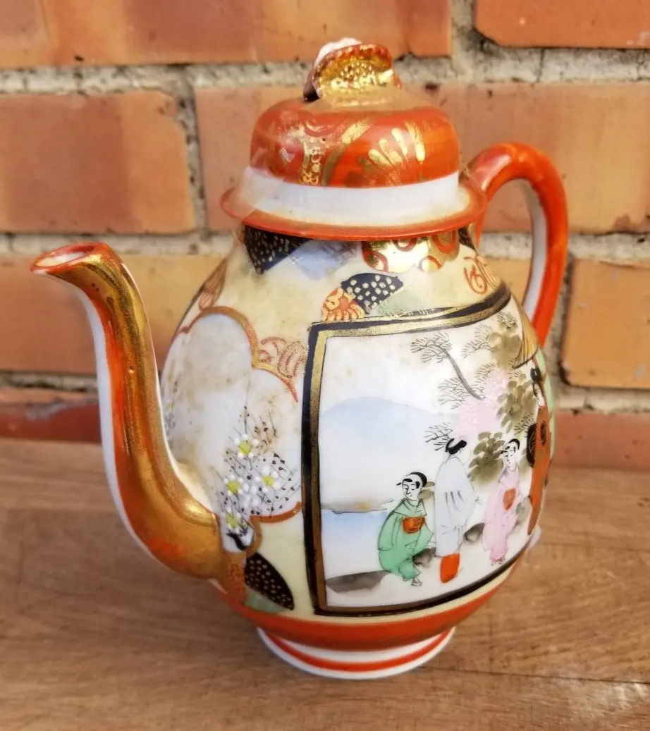 Japanese Orange Teapot Wth People 1