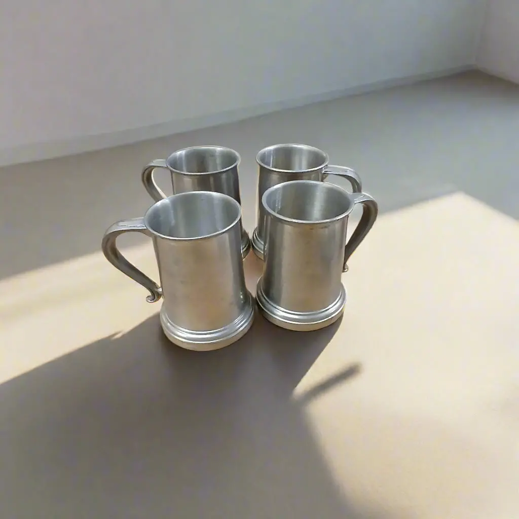 Set Of 4 Pewter Tankards 1