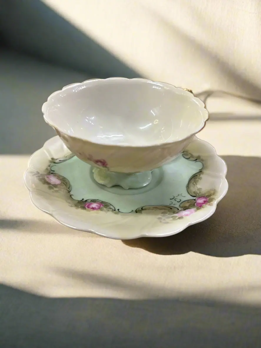 Green Porcelain Cup And Saucer 1