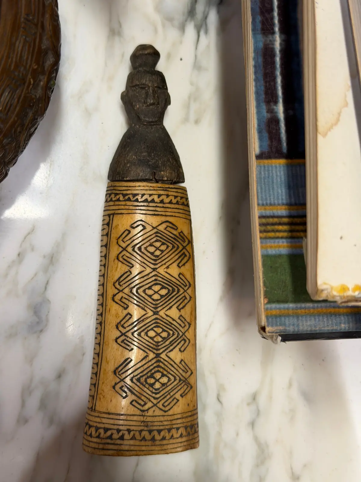 Carved Bone Figurine With Geometric Design 1