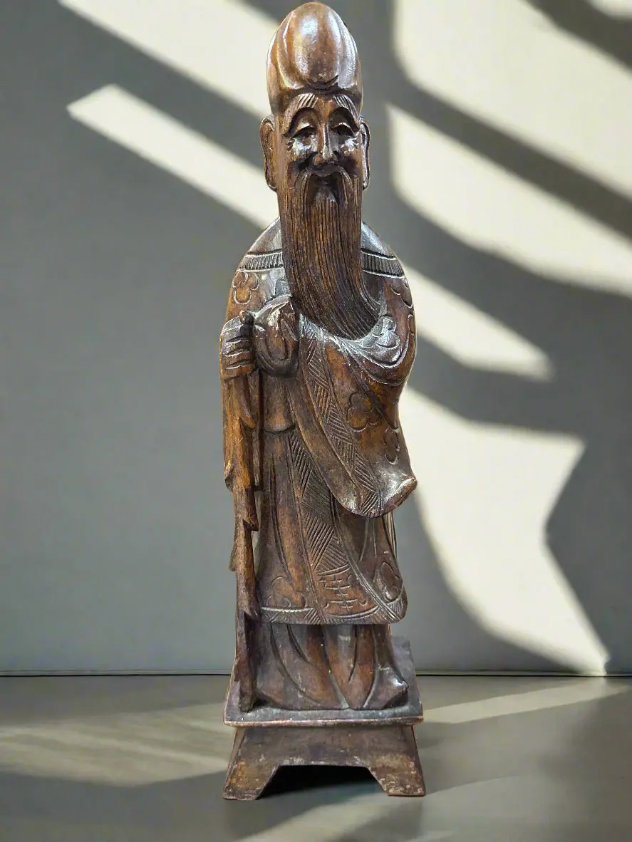 Tall Carved Asian Figure 1