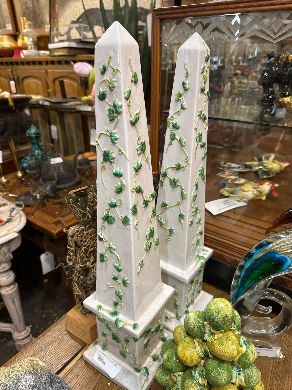 Pair Of Beige With Green Vined Glazed Pottery Obelisks 1