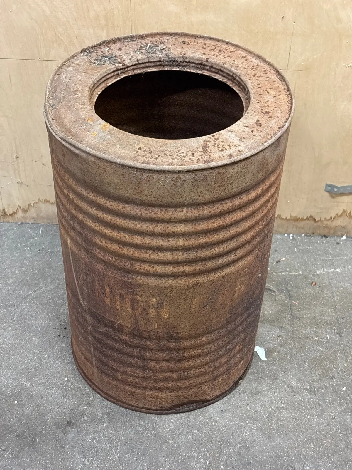 Cylindrical Advertising Rust Colored Tin 1