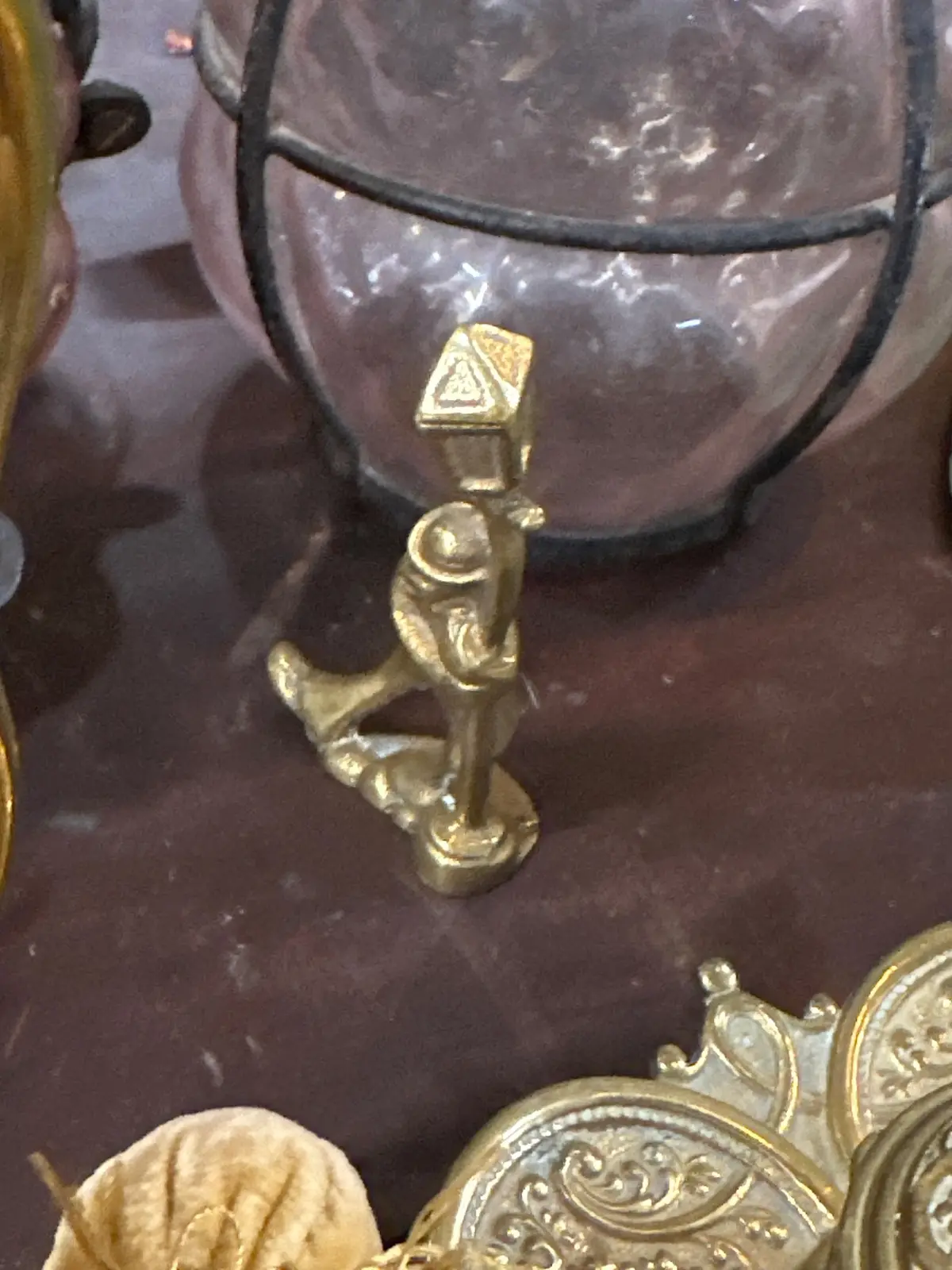 Brass Man Leanning On Street Lamp 1