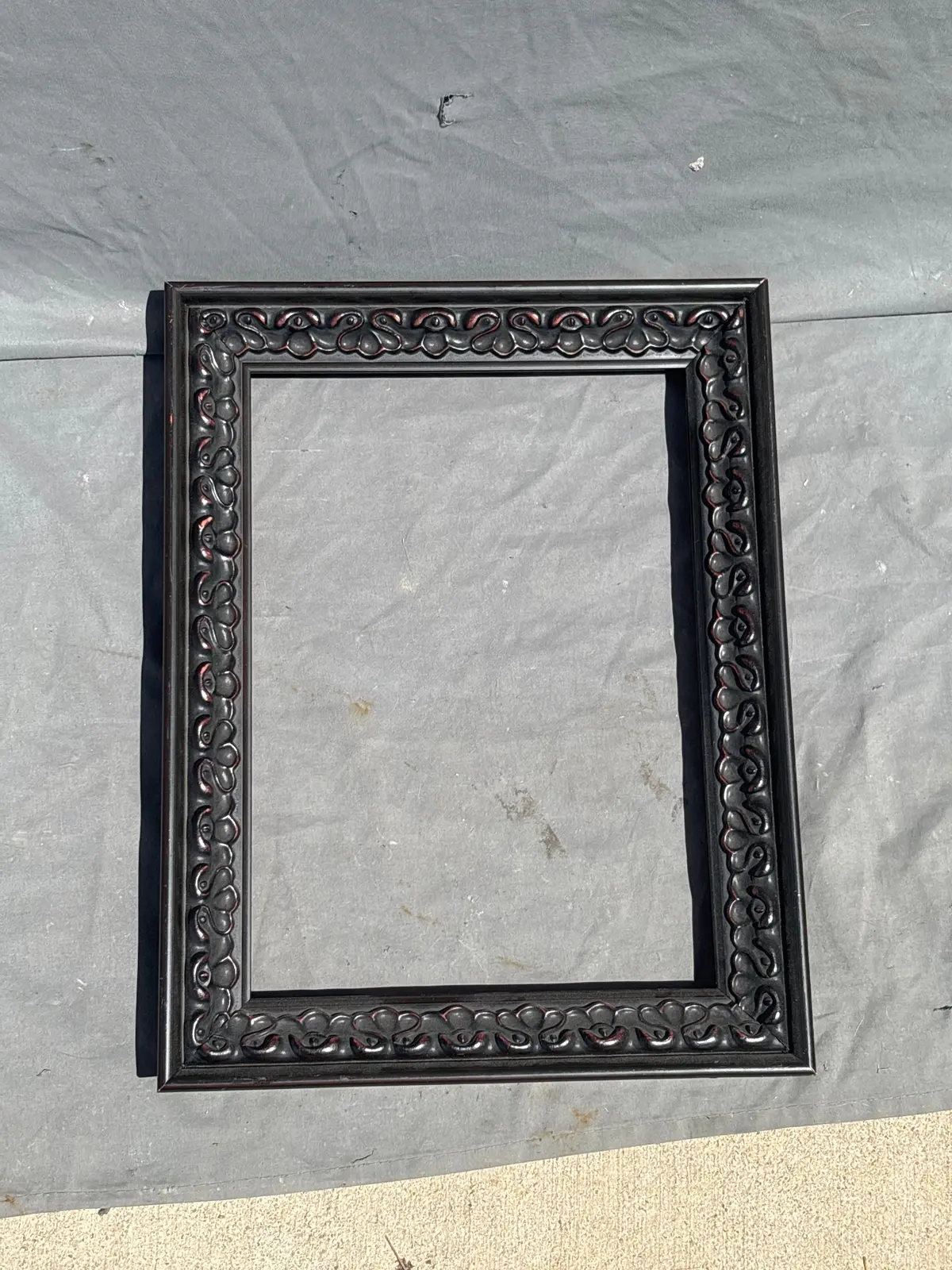 Small Black Frame With Molded Carving 1