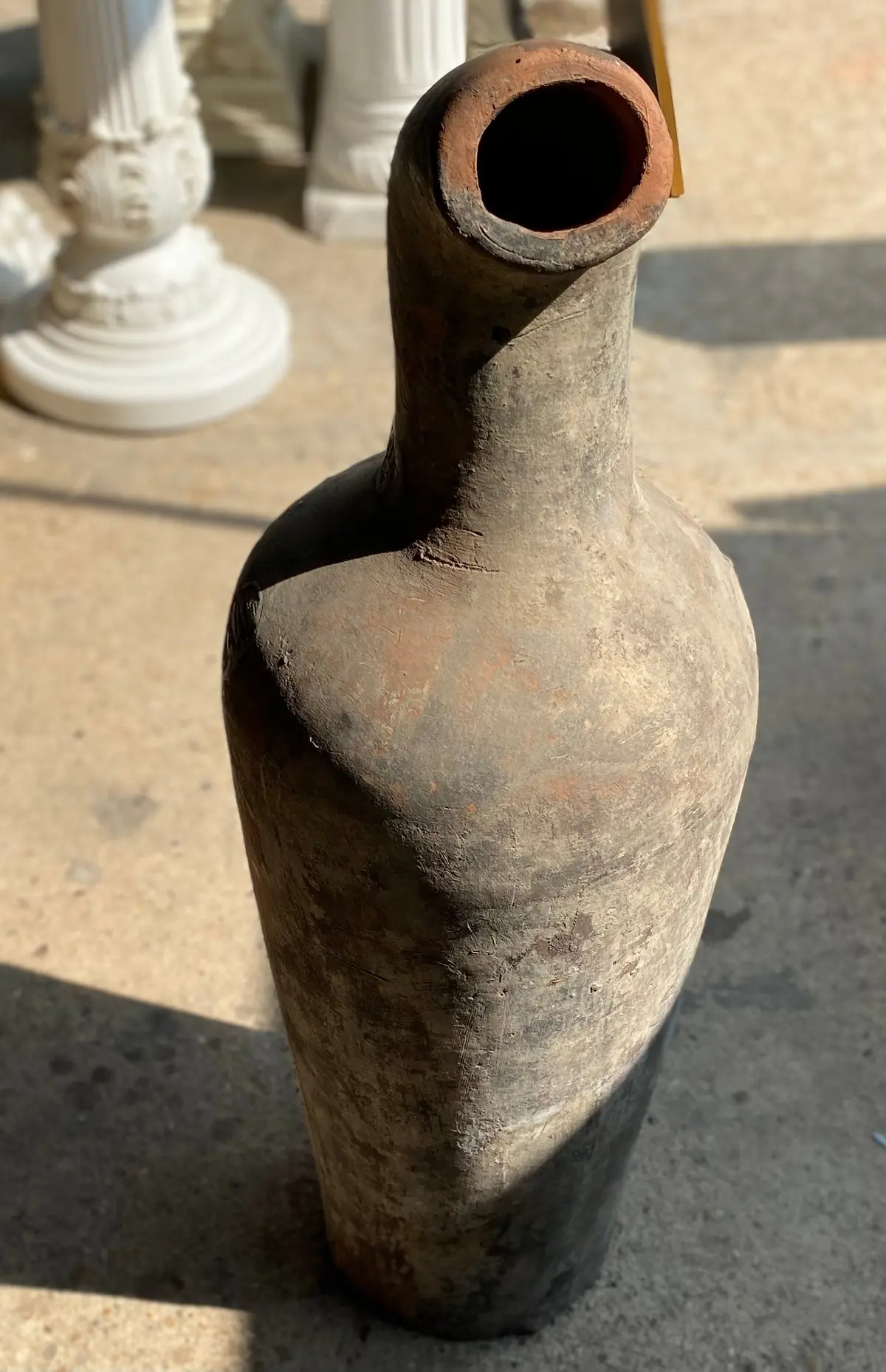 Tall Terracotta Jug With Carved Spout 1