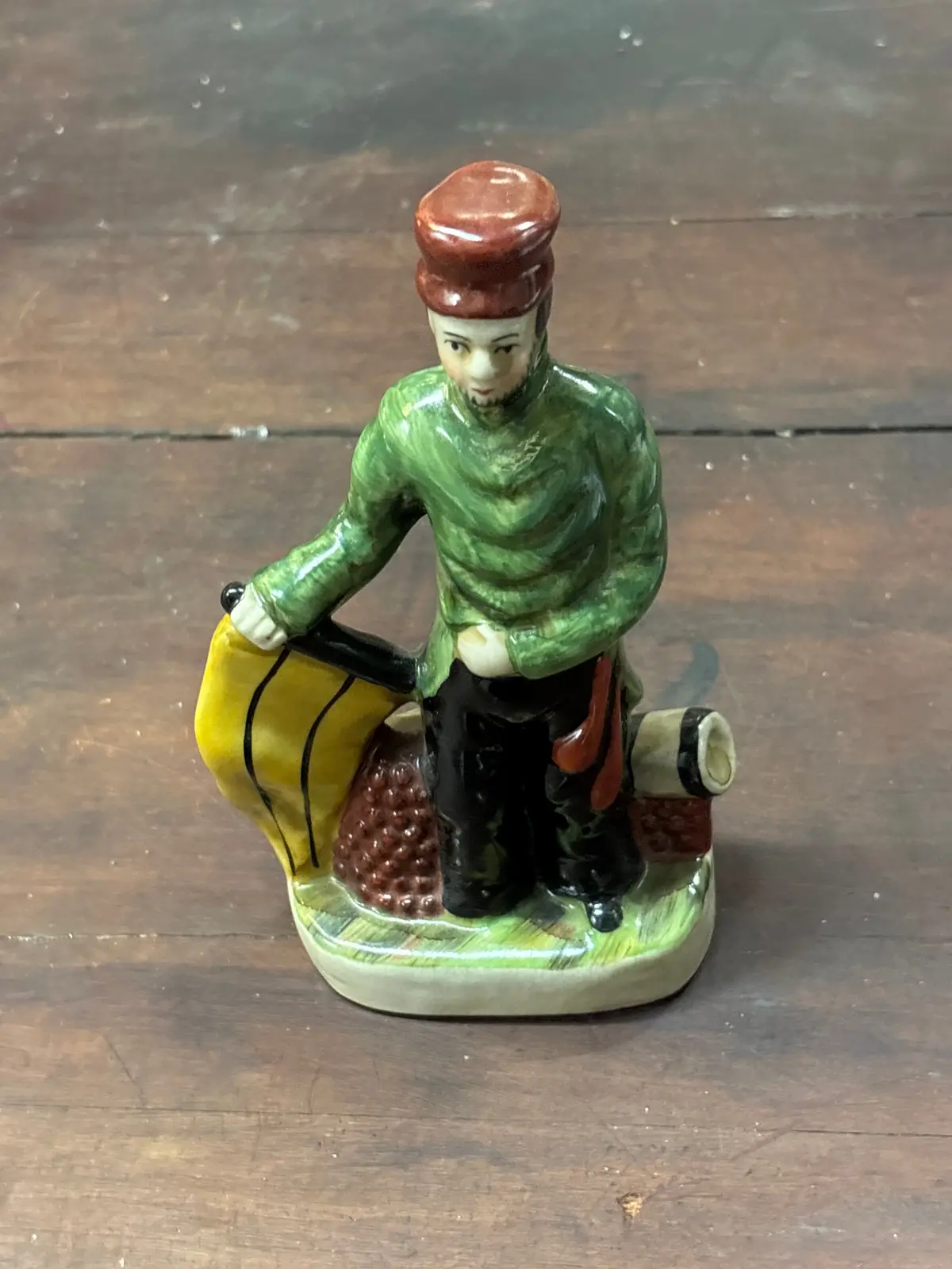 Porcelain Staffordshire Style Figure Of Man With Green Jacket 1