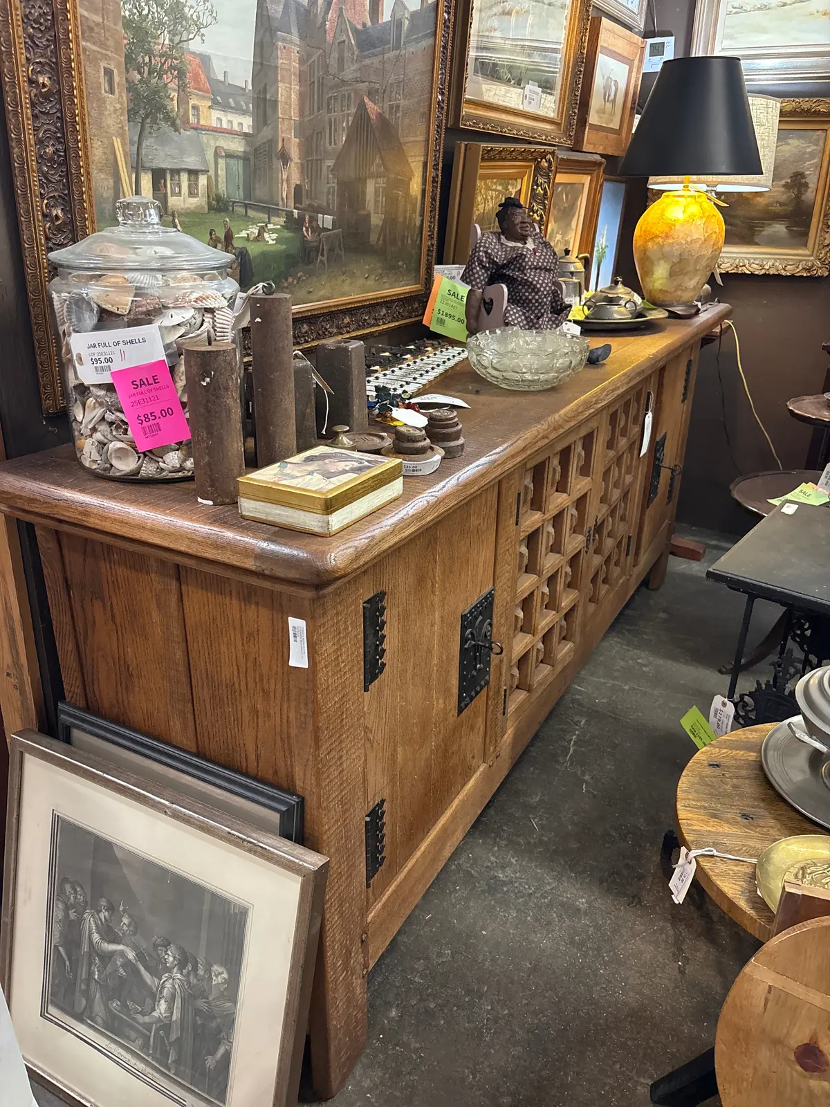 Paneled Doors Rustic Sideboard With Ornate Iron Escutcheon 1