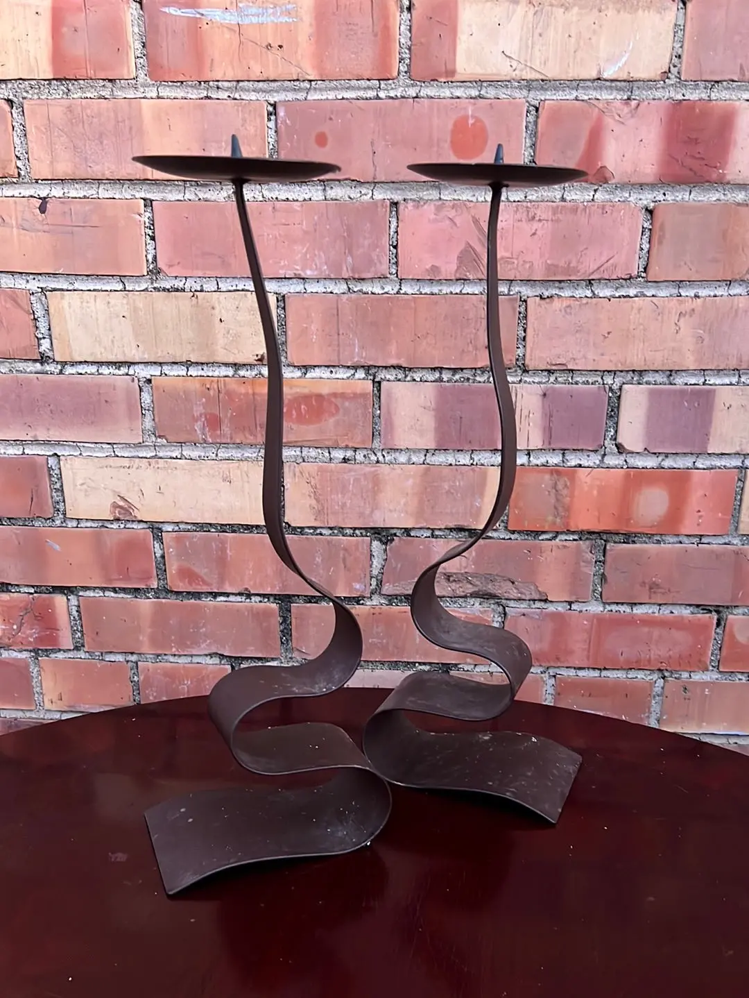Pair Of Large Wavy Bottom Iron Candle Stands 1