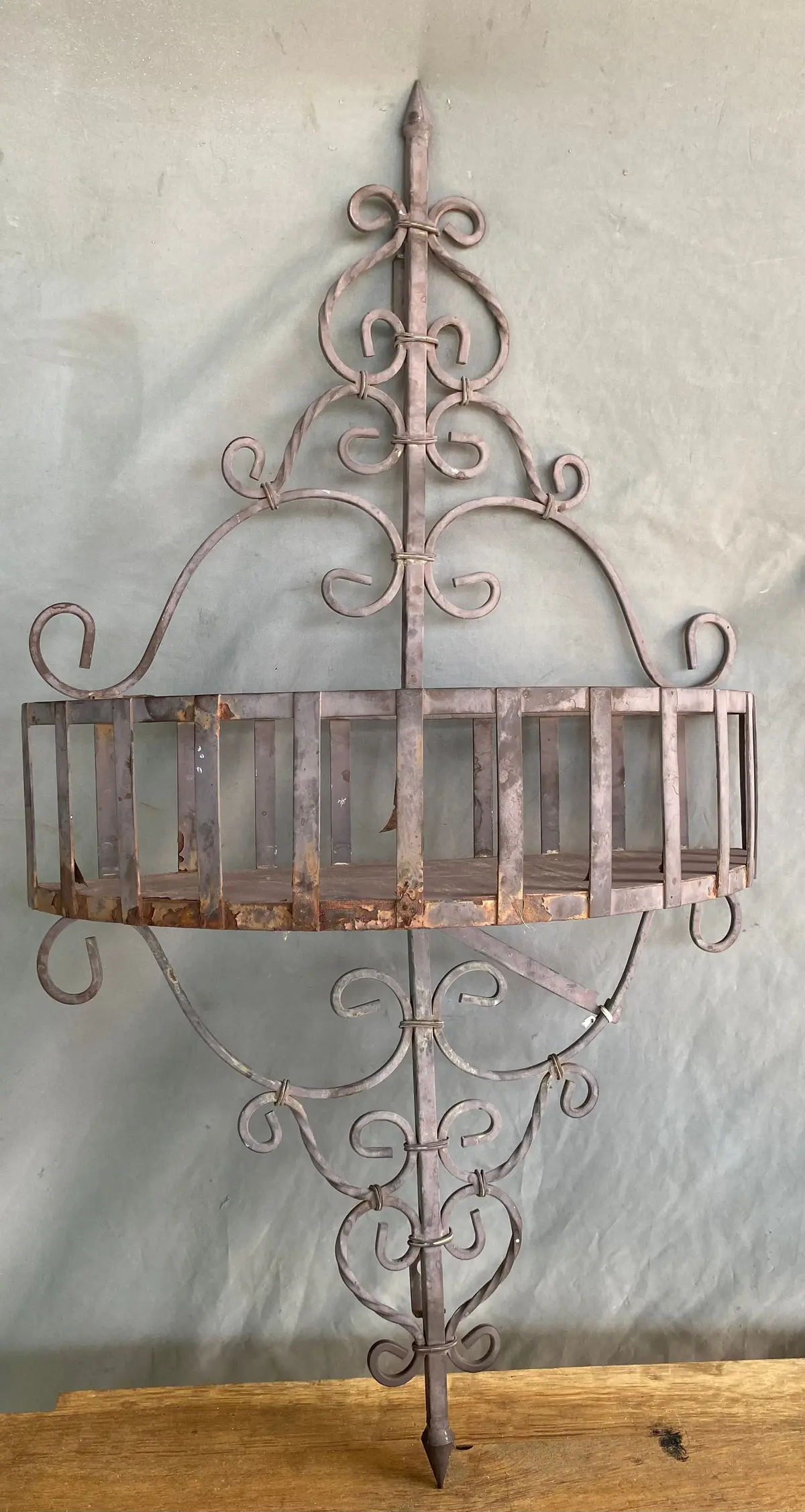 Metal Wall Planter On Brown Shelf 1