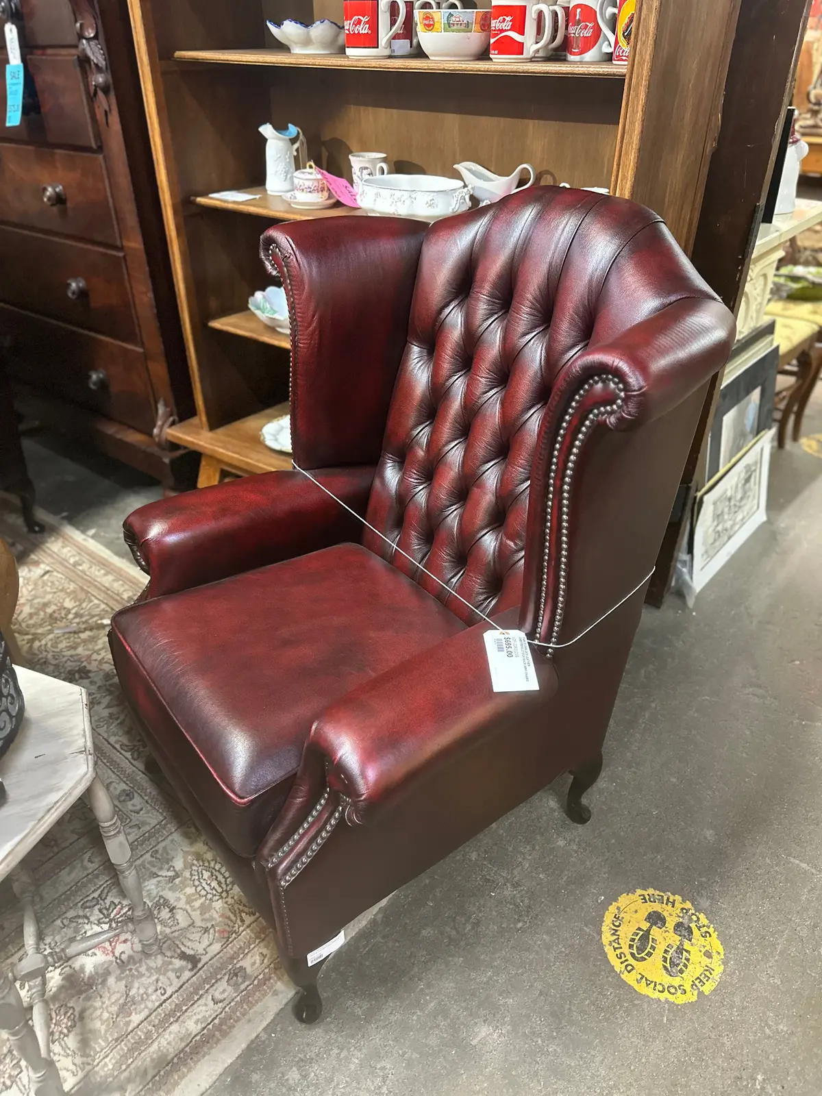 Pair Of Oxblood Leather Chesterfield High Back Arm Chairs 1