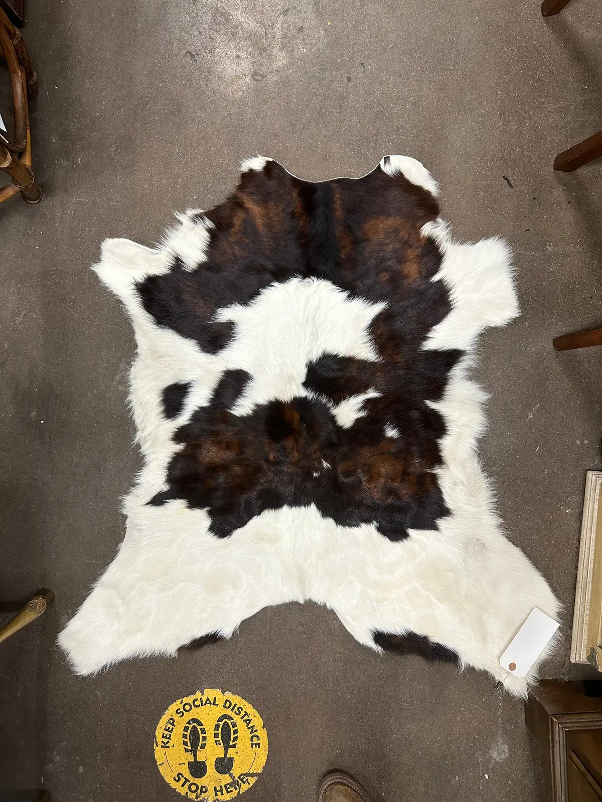 Small Brown And White Cowhide Rug 1