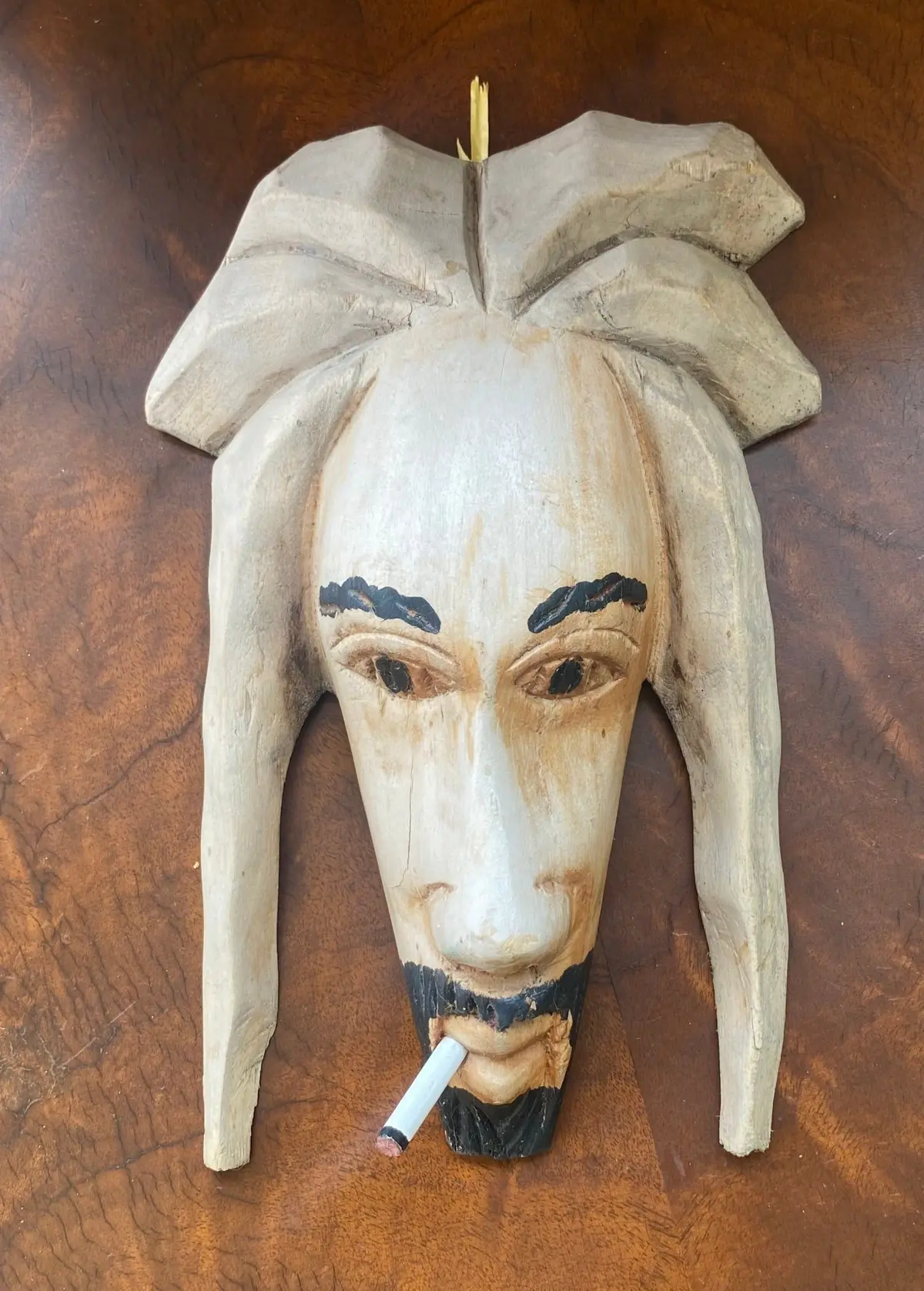 Carved Face Of A Smoker 1