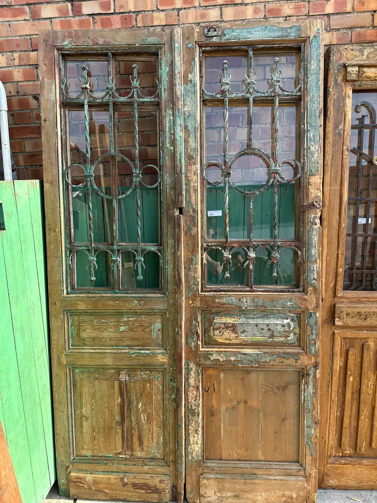 Pair Of Egyptian Iron Inset Green Wood Doors With Casement Windows 1